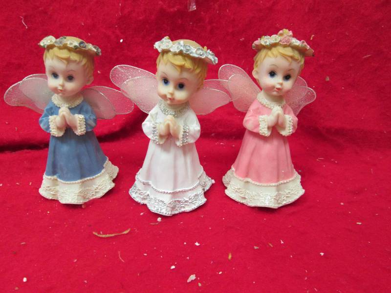 Qty 3 Angels white , blue, and pink...