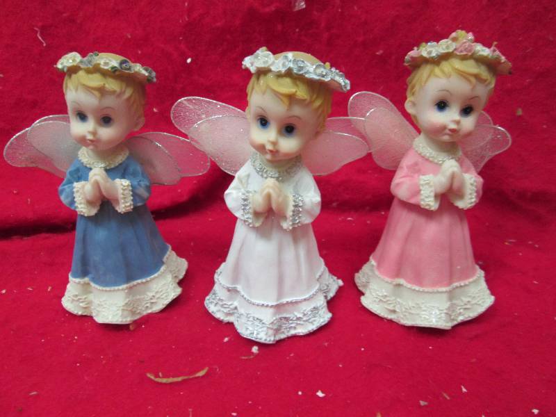 Qty 3 Angels white , blue, and pink...