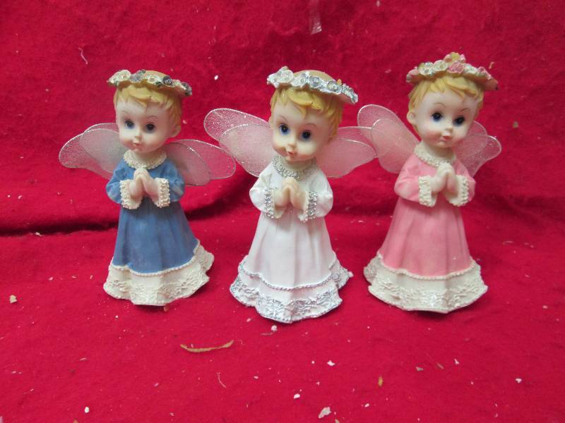 Qty 3 Angels white , blue, and pink...