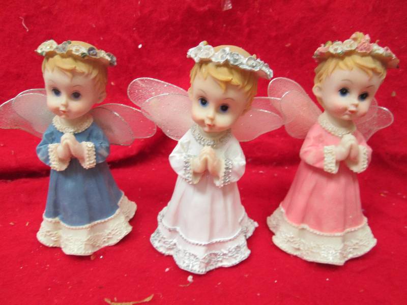 Qty 3 Angels white , blue, and pink...