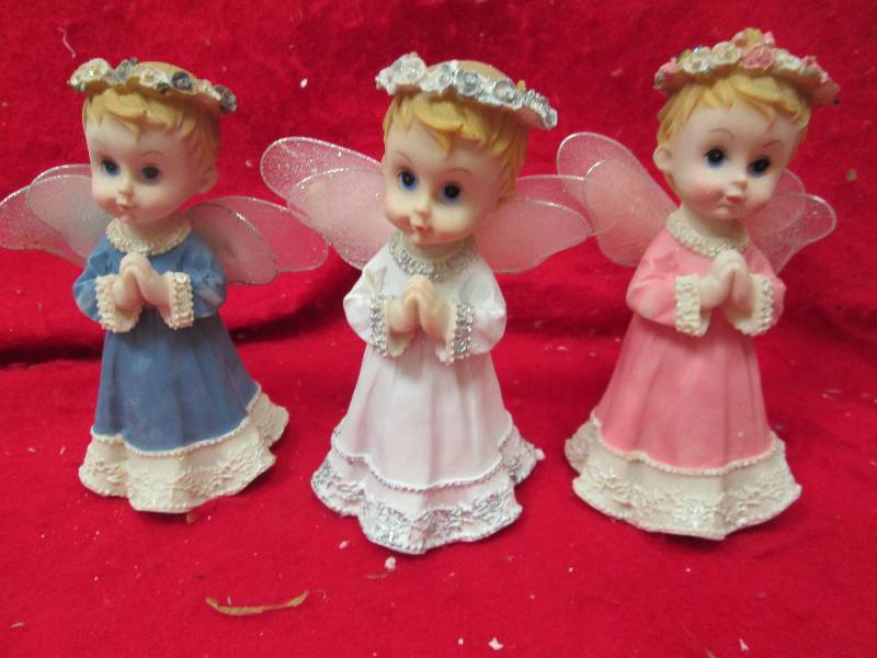 Qty 3 Angels white , blue, and pink...