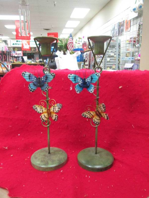 Qty 2 this crafted metal candlestic...