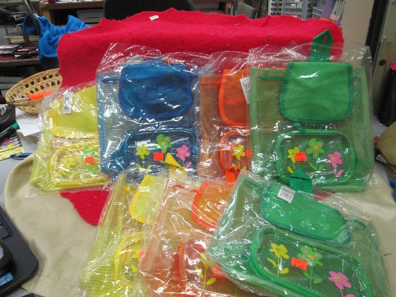 Qty 7  Little back packs with flowe...