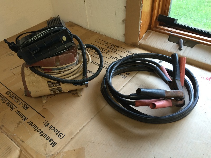 lot 115 image: Air Compressors - (1) 115 volts (1) 12 Volts DC, Set of jumper cables