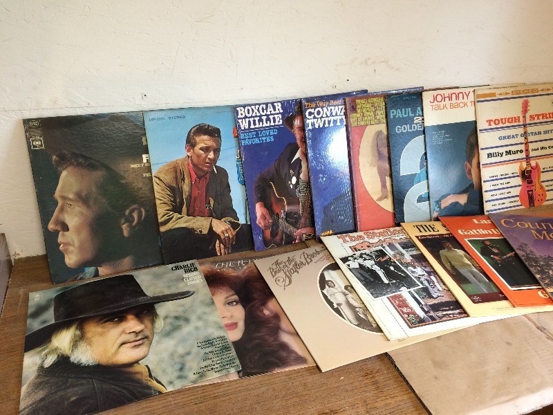 lot 125 image: A HUGE lot of vintage Old Time Country Albums  approx. 50 separate albums in the covers. What a collection. You can have it all at your price