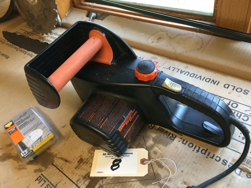 lot 8 image: Remington Electric Chain saw  includes extra chain  3 HP, 16