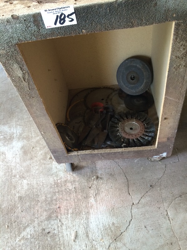 lot 185 image: Storage Box Lot items including assorted saw blades, cutting wheels, grinding stone and misc - buy it all at your price