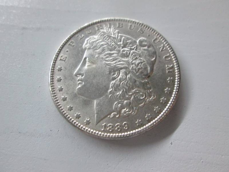 lot 24 image: 1889 Morgan Silver Dollar