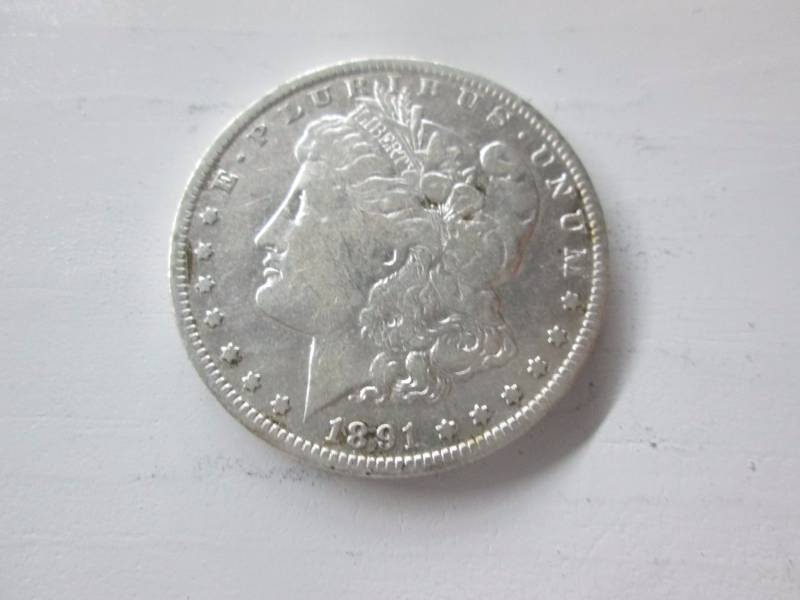 lot 30 image: 1891 O Morgan Silver Dollar