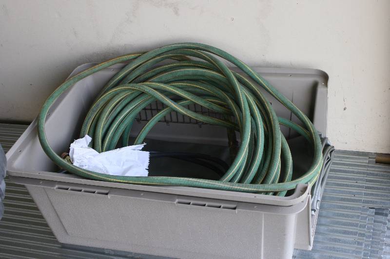 lot 252 image: Floor Lot Including Plastic Dog Kennel Garden Hoses.