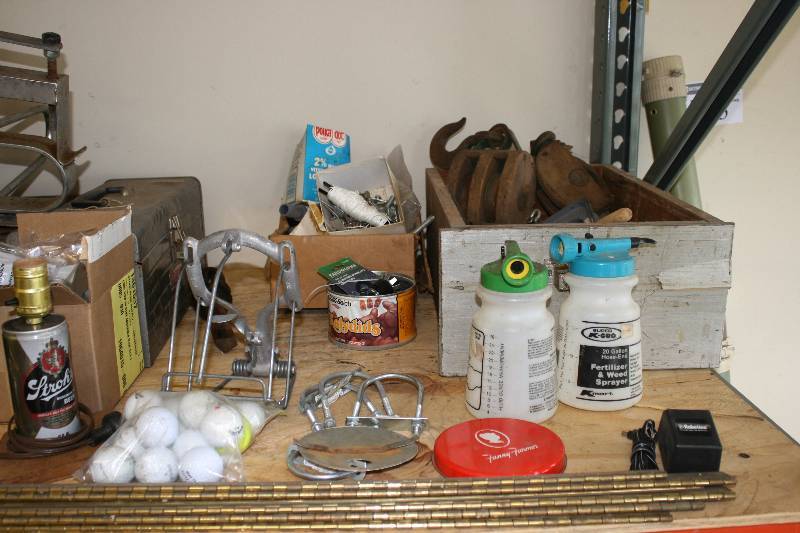 lot 232 image: Shelving Lot Including Box of Glassware Schells Beer Can Lamp Base Adjustable Light And More Shelf Not Included.