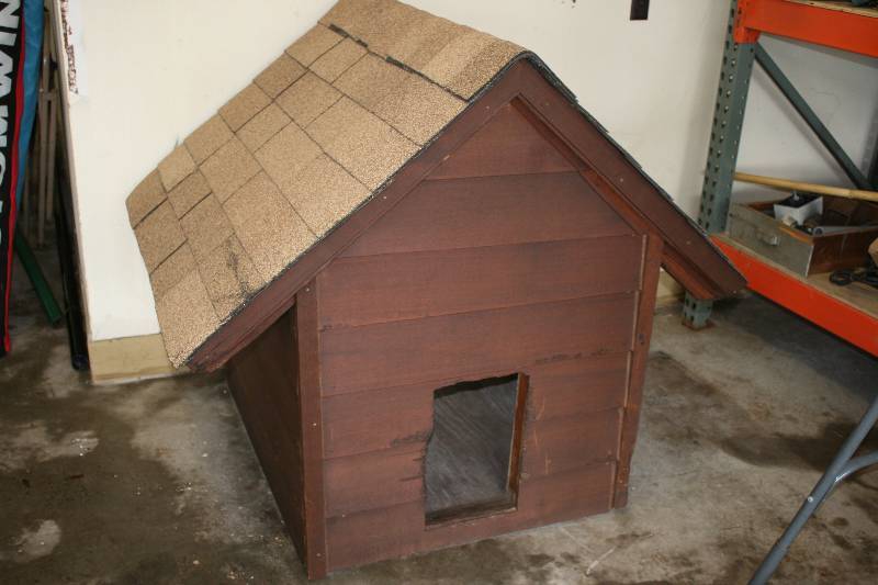 lot 243 image: Large Wooden Dog House wA-Frame Roof 53 x 43 x 48.