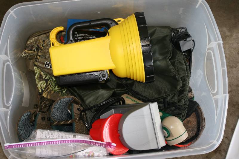lot 244 image: Box Lot Including Large Flash Light Rock Tumbler Hunting Boots & Camoflauge Gear And More.