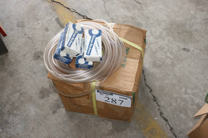lot 287 image: Box Lot Including House Wash Vehicle Wax Clear Plastic Tubing And More.
