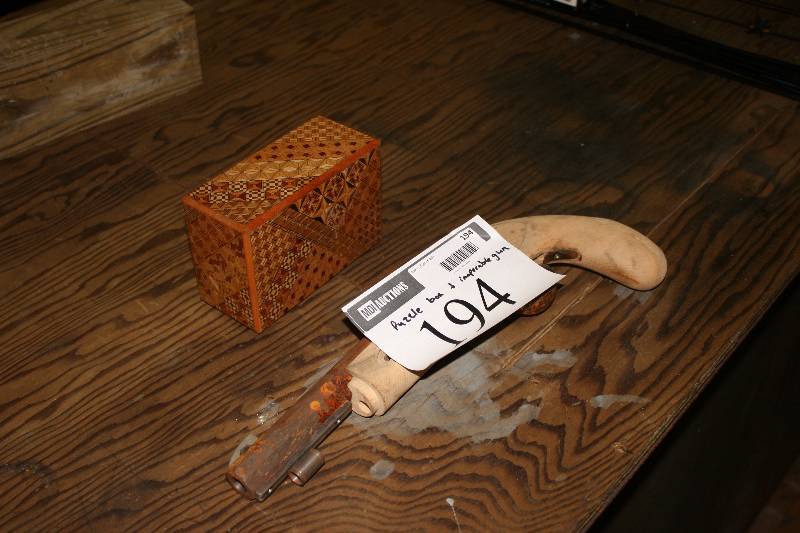 lot 194 image: Lot of (2) Including Vintage Puzzle Box Vintage Hand Gun, Inoperable.