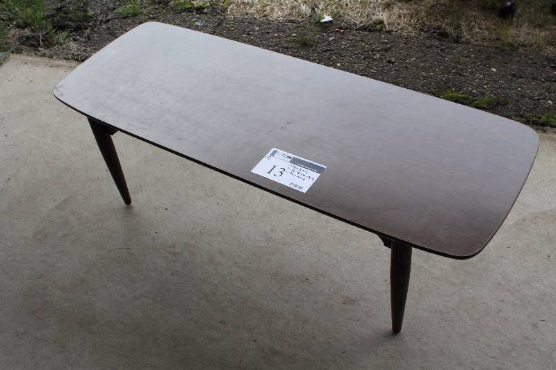 lot 13 image: Lot of (3) Including Wooden Wine Rack Wood-Style Table, Rectangle, Dark Finish Circular Wooden Table wFold Down Extensions 48 x 16 x 18 36 Diam x 31 36 x 18 x 12.
