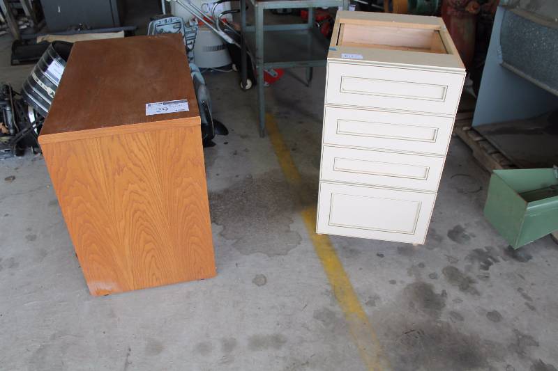 lot 29 image: Lot of (2) Wooden Cabinets wDrawers White Finish w4 Drawers Wood Finish w2 Drawers 30 x 20 x 24 18 x 25 x 35.