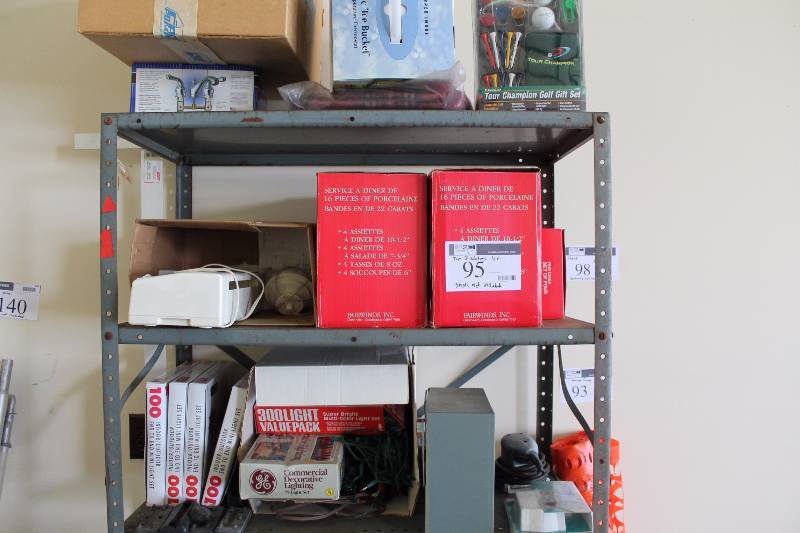 lot 95 image: Shelving Lot Including Organizational Unit wMultiple Drawers Magic Vac Maxima Food Saver Sharper Image Electronic Ice Bucket And More Includes Only Top 3 Shelves Shelving Unit Not Included.
