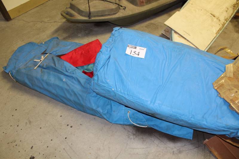 lot 154 image: Raft Parts wWooden Pieces & Plastic Tarp Bag.