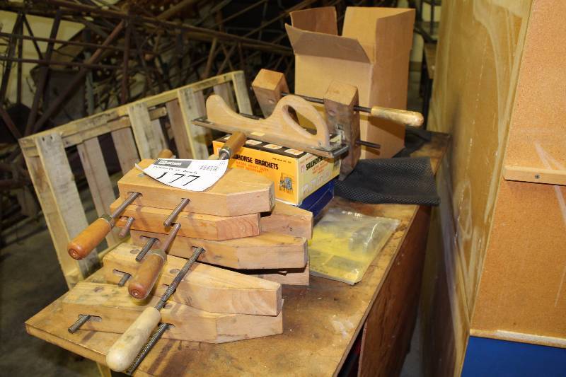 lot 177 image: Contents of Bench Including Wooden Clamps Metal Hardware Heat Pro Plus Heat Gun And More.