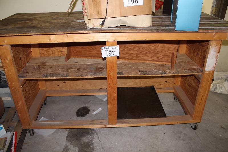 lot 197 image: Wooden Shelving Unit wWork Top & Wheels 85 x 36 x 45 Contents Not Included.