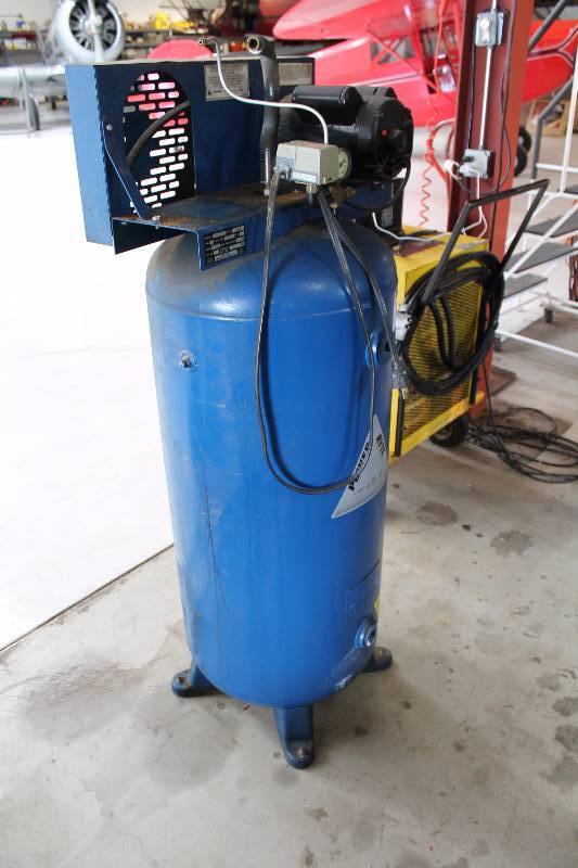 lot 324 image: Sanborn Commercial Air Compressor Model JH-5 12 Seri. 21310 H.P. 5 Max Pressure 150 PSI 60 Gallon Tank.