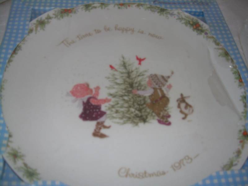 knowels collector plate, 1 native harmony and 1 holly hobby plate