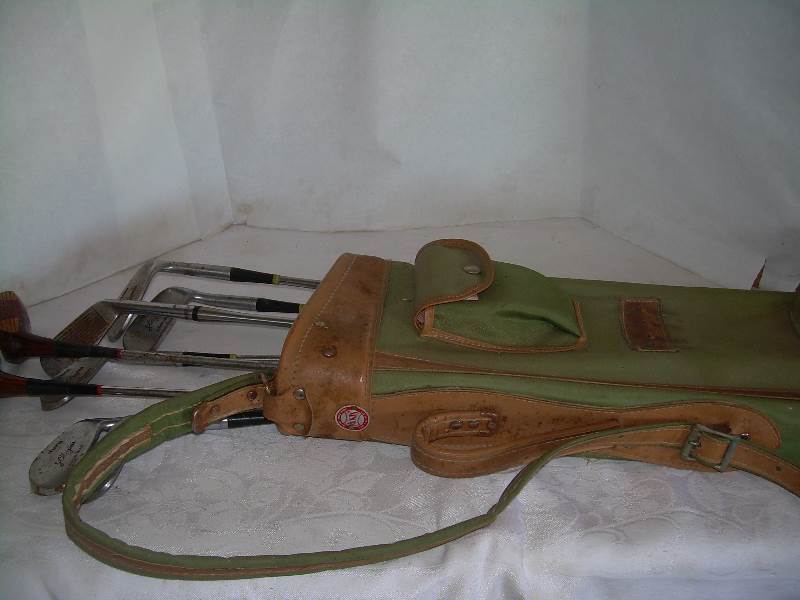 8 collectable golf clubs with bag
