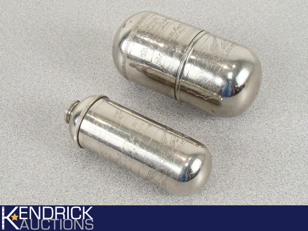 lot 13 image: Antique 1890s Metal Victory Capsule Holding Smaller Capsule