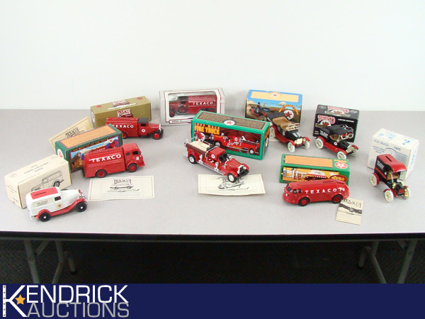 lot 15 image: Lot of 9 New in the Box Collectible Ertl Die Cast Texaco Banks