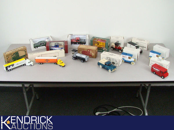 lot 16 image: Lot of 13 New in the Box Collectible Ertl, and SpecCast Die Cast Jim Beam BanksTrucks