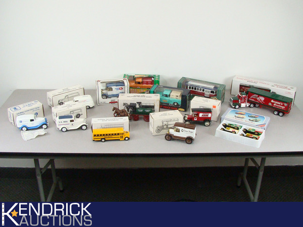 lot 17 image: Lot of 16 New in the Box Collectible Ertl Die Cast BanksTrucks