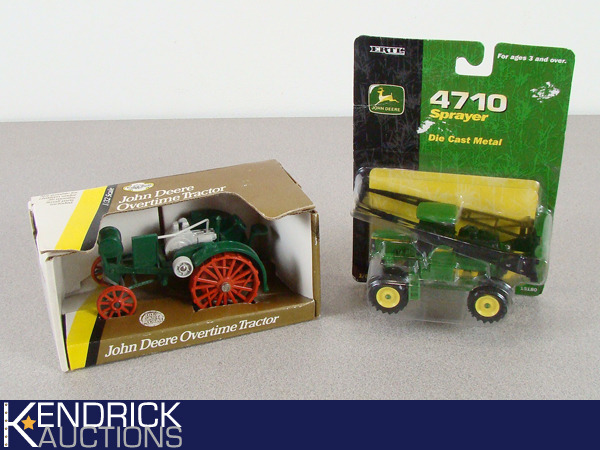 lot 18 image: 2 New in the Box Ertl Die Cast John Deere Tractors