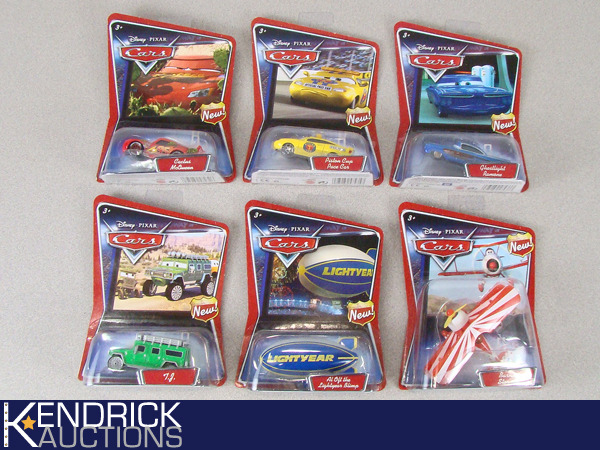 lot 21 image: Lot of 6 Disney Pixars Cars MINT on Card Die Cast Cars