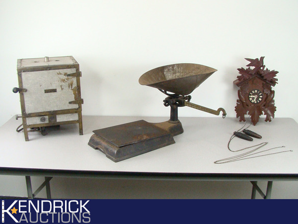 lot 50 image: Vintage E.H. Sargent Drying Oven, Antique Cast Iron Scale, and Vintage Wood Germany Coo Coo Clock