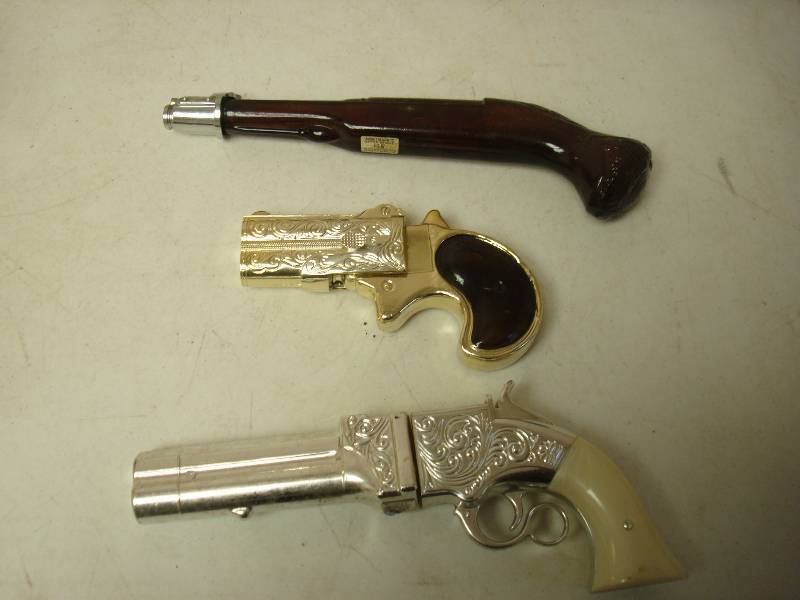 Lot Of Cologne Bottle Guns