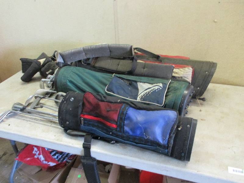 lot 60 image: Golf clubs and bags