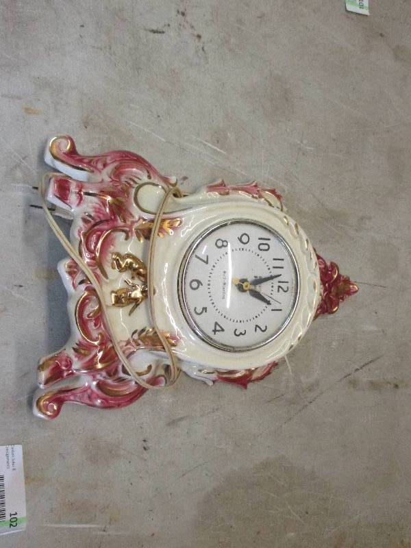 lot 102 image: Antique clock
