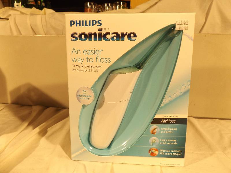 lot 16 image: Sonicare Flosser