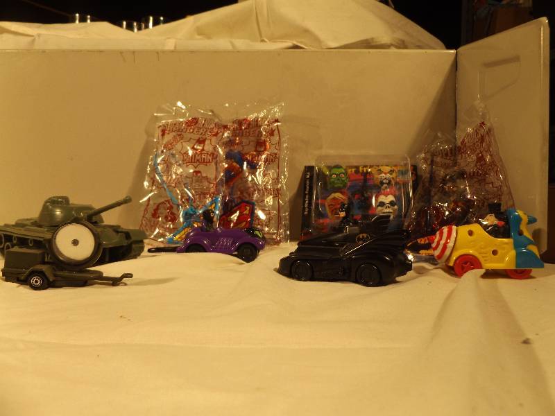 lot 62 image: Batman, Wonder Woman, Superman, Army Figures