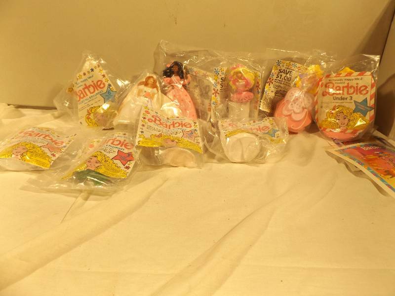 lot 71 image: 14 Barbies in Unopened Bags