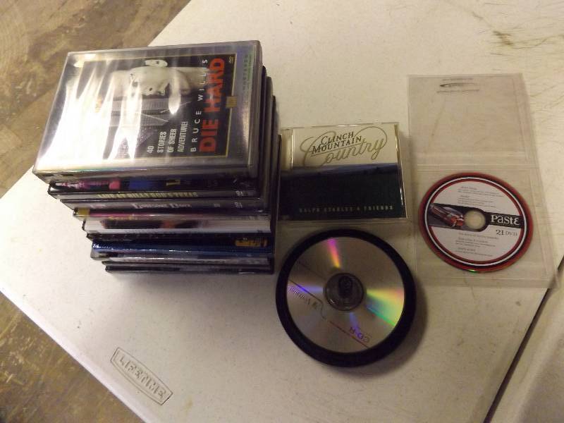 lot 117 image: Movie DVDs, Disc Holder