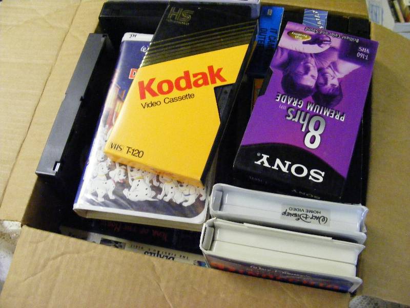 lot 123 image: Assorted VHS tapes including some Disney