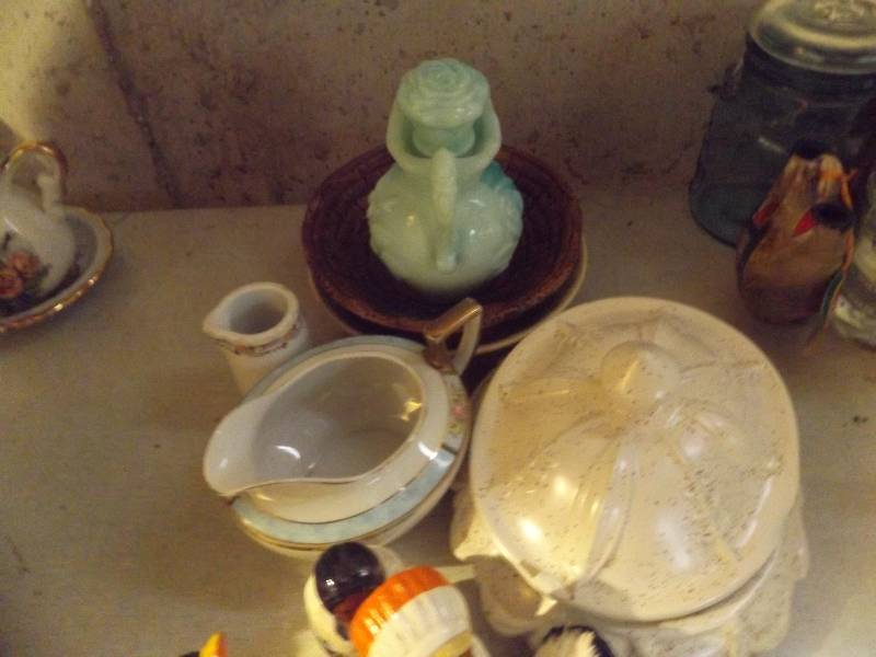 covered dish, gravy boat, small decanter