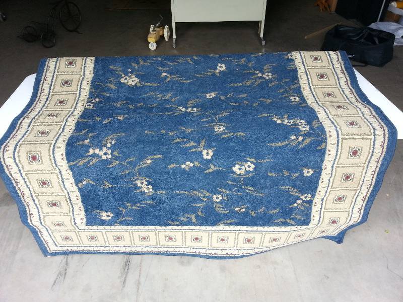 lot 101 image: Blue  Tan Floral Area Rug
