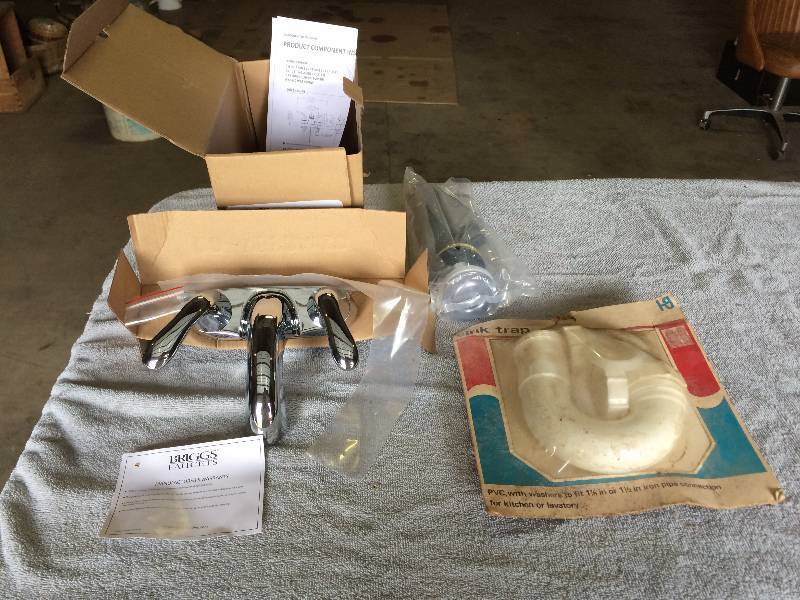 lot 94 image: New Briggs Faucet in Box and More Plumbing Items