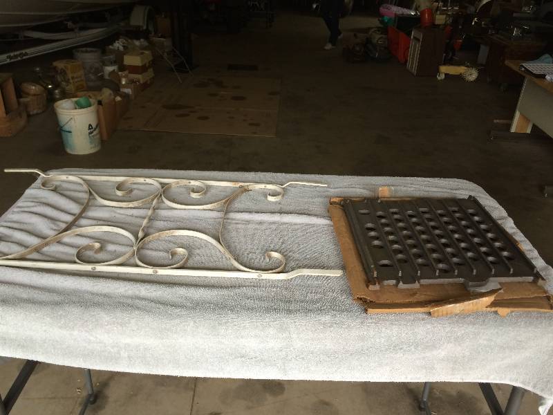 lot 168 image: Wood Stove Cast Iron Grate and a Piece of Wrought Iron