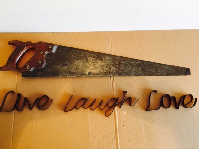 SIGN AND SAW