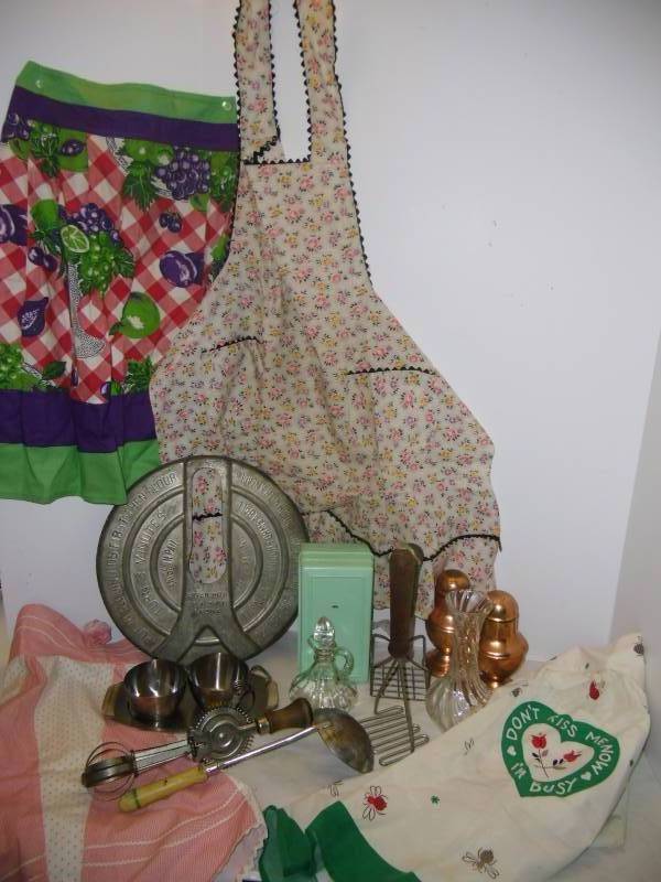 lot 22 image: Old Time Kitchen  Aprons, Wood Handle Tools, Dough Machine Cover 