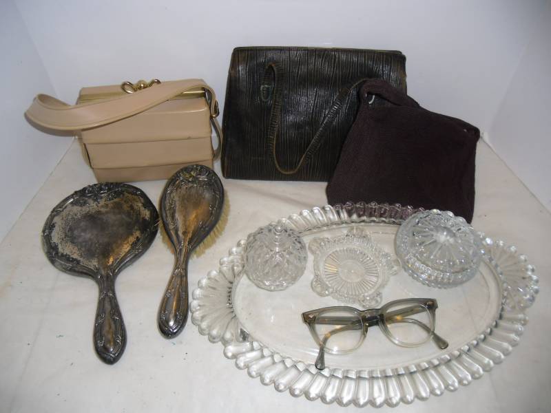 lot 28 image: Vintage Ladies Vanity Dresser Glass Tray. Cats Eye Glasses, Purses